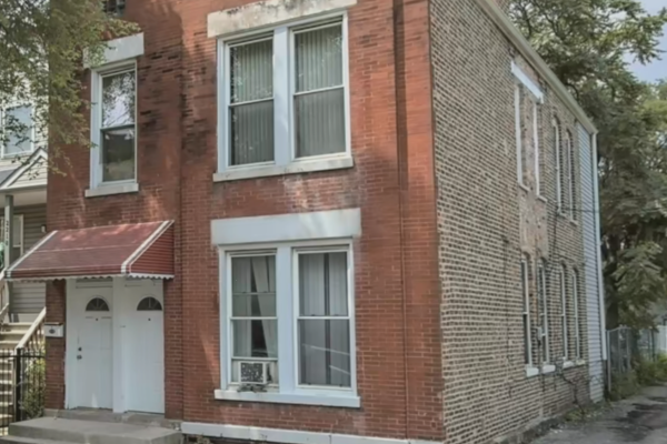 Chicago two-flat brick home representing housing resources